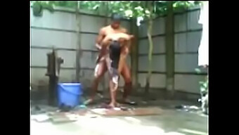 Neha, A Bengali Bhabhi, Bathes Outdoors In The Nude And Pretends To Interact With A Street Boy